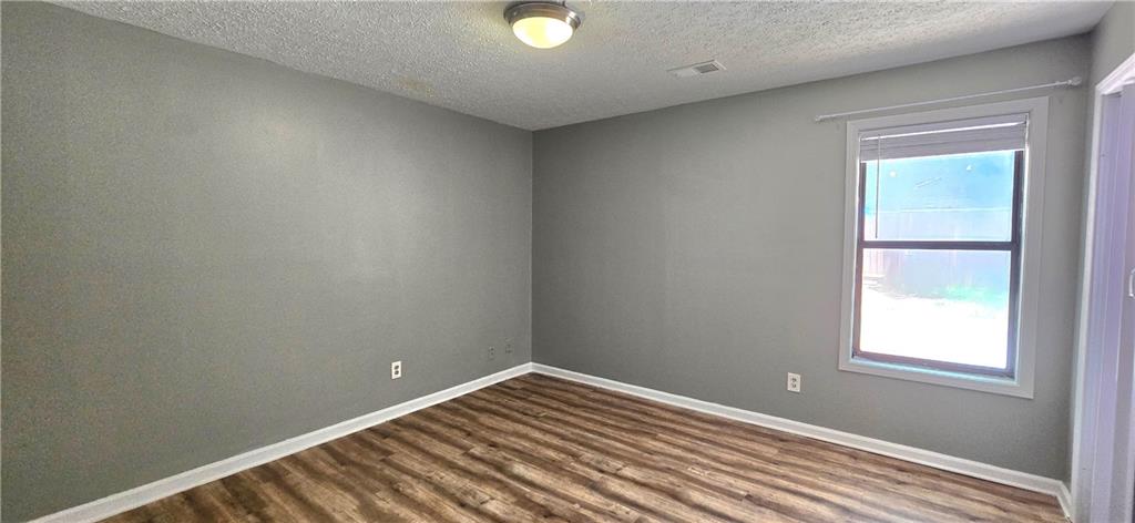 1120 Rappahannock Drive Alpharetta, GA 30009 - Photo 24 of 35 an empty room with window