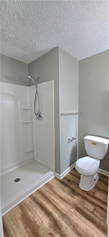 1120 Rappahannock Drive Alpharetta, GA 30009 - Photo 27 of 35 a bathroom with a shower and a toilet