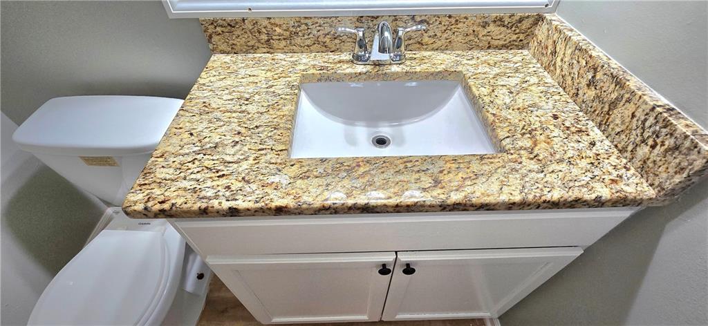 1120 Rappahannock Drive Alpharetta, GA 30009 - Photo 30 of 35 a bathroom with a sink and mirror