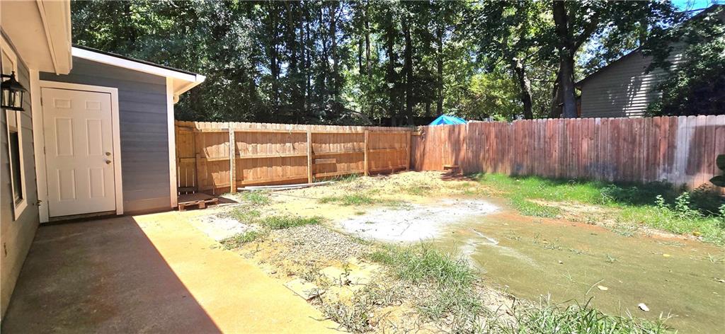 1120 Rappahannock Drive Alpharetta, GA 30009 - Photo 33 of 35 a view of a backyard with pathway