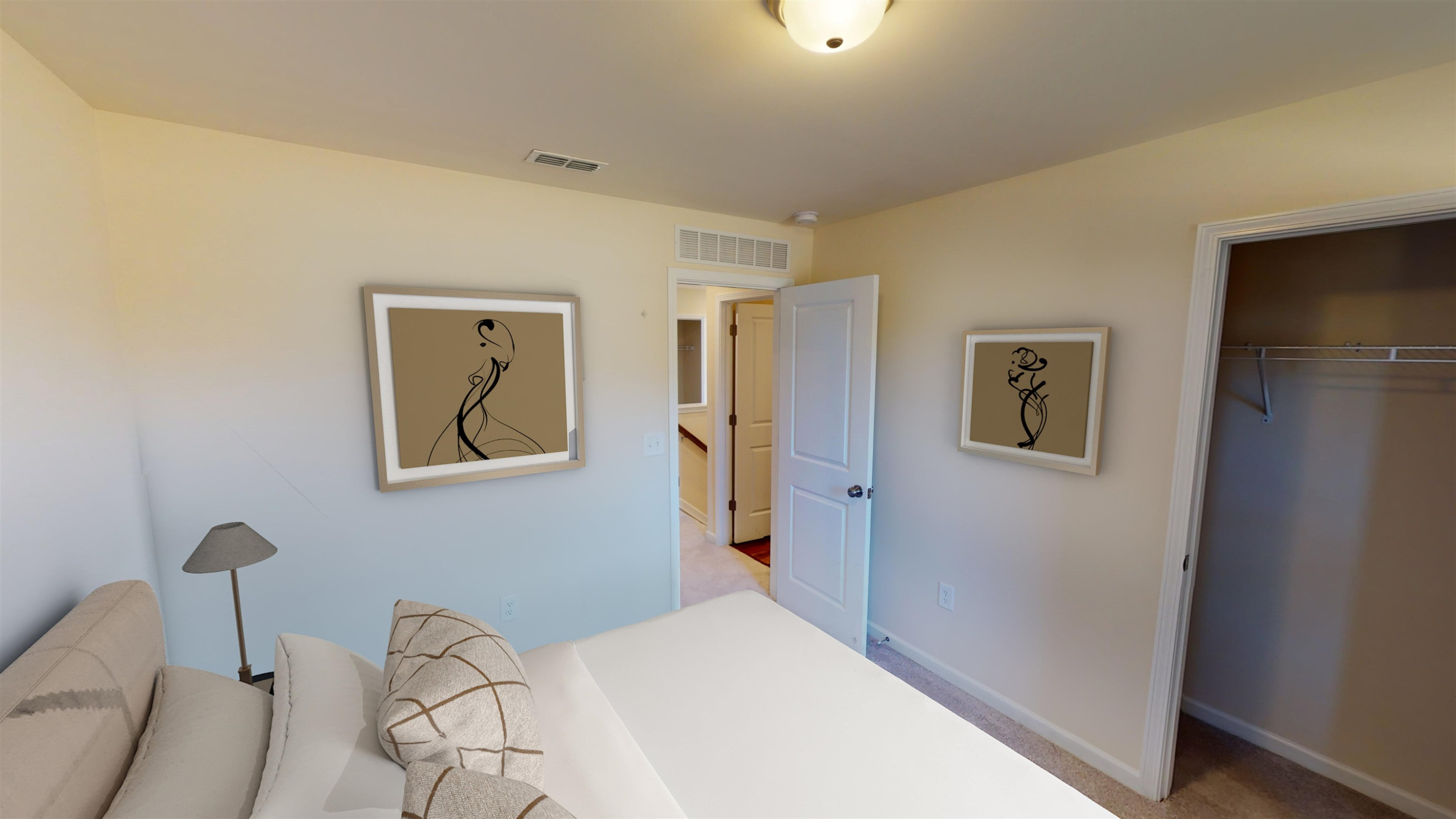 3500 Pinnacle Peak Drive Raleigh, NC 27604 - Photo 11 of 19 a bedroom with a bed and a painting on the wall