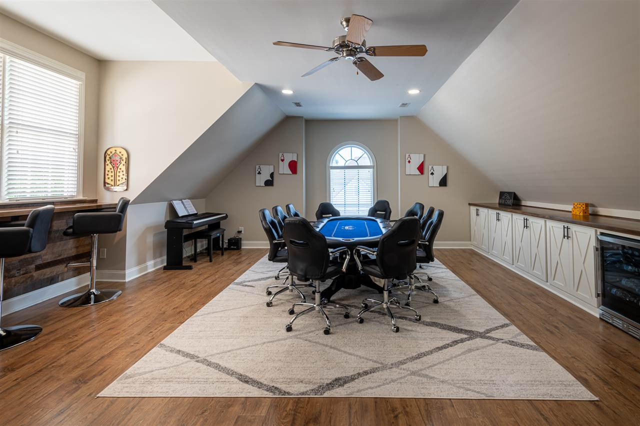 2916 SnapsWell Street Raleigh, NC 27614 - Photo 19 of 30 This Game Room offers Beautiful and Easy Clean Up Flooring, Custom Built Cabinetry with Wood Counter Top and Stunning Bar Top. Plenty of Space for Hobbies, Crafts, Games, Toys and Furniture. Make it Your Own ! Bonus/Game Room