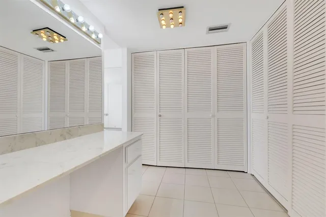 a view of a hallway with closet