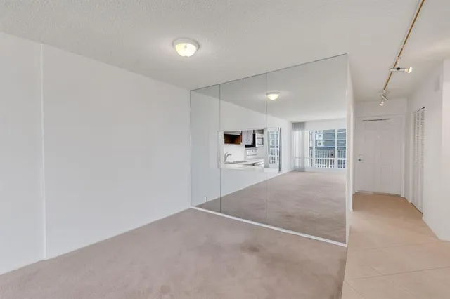 a kitchen with a sink stove and microwave