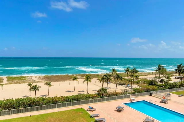 a view of a hallway with windows