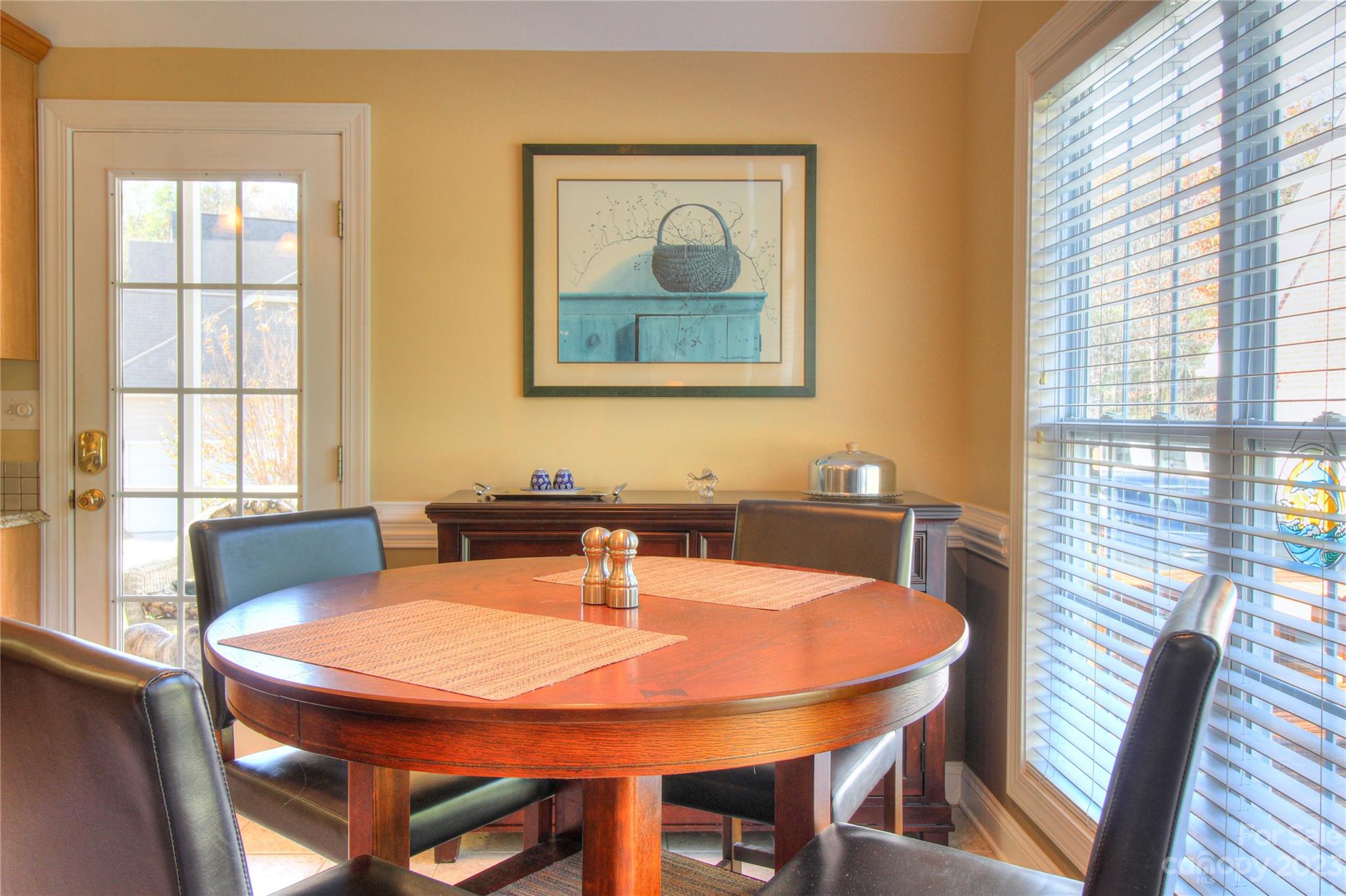 1016 Wesley Downs Road Wesley Chapel, NC 28110 - Photo 14 of 40 a view of a dining room with furniture and window