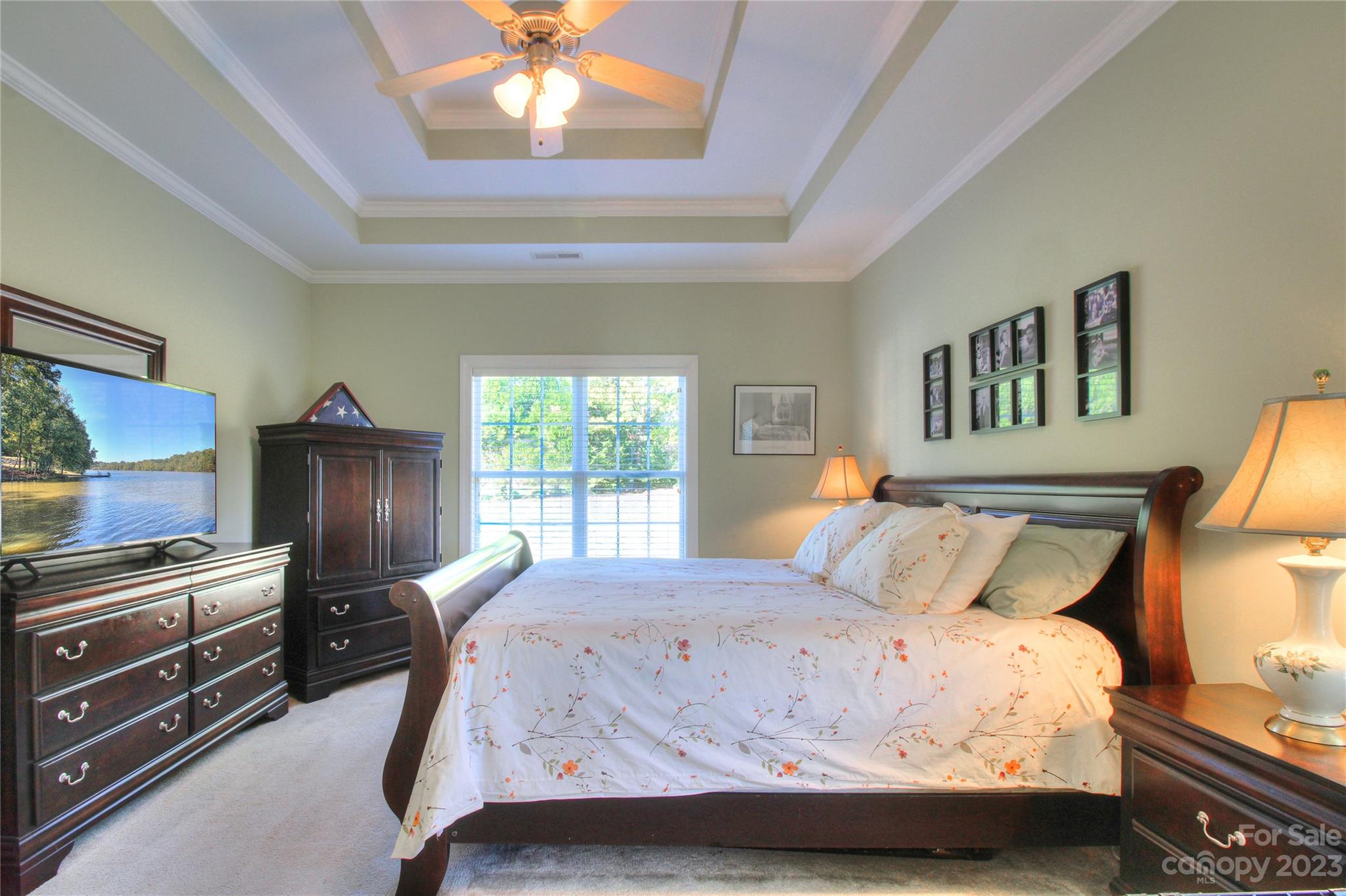 1016 Wesley Downs Road Wesley Chapel, NC 28110 - Photo 15 of 40 a bedroom with a bed and a dresser