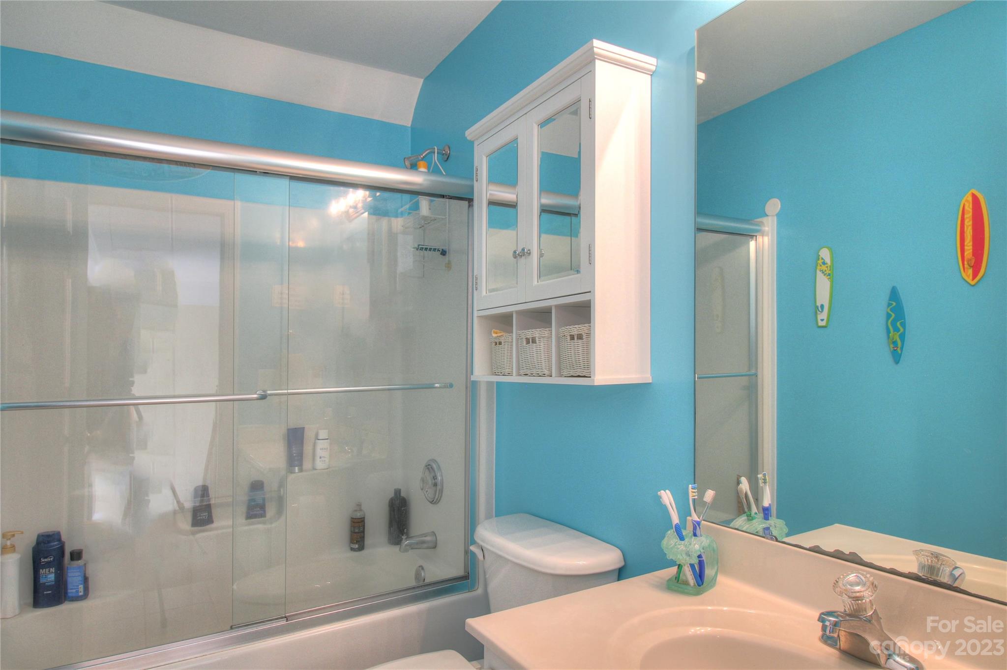 1016 Wesley Downs Road Wesley Chapel, NC 28110 - Photo 20 of 40 a bathroom with a sink and a mirror