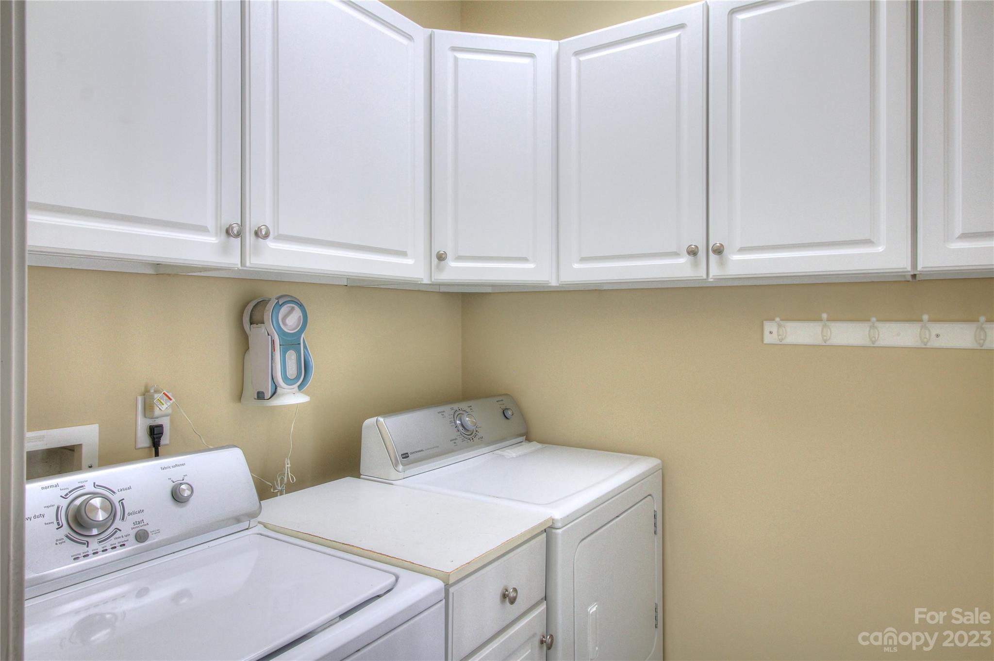 1016 Wesley Downs Road Wesley Chapel, NC 28110 - Photo 26 of 40 a utility room with dryer and washer