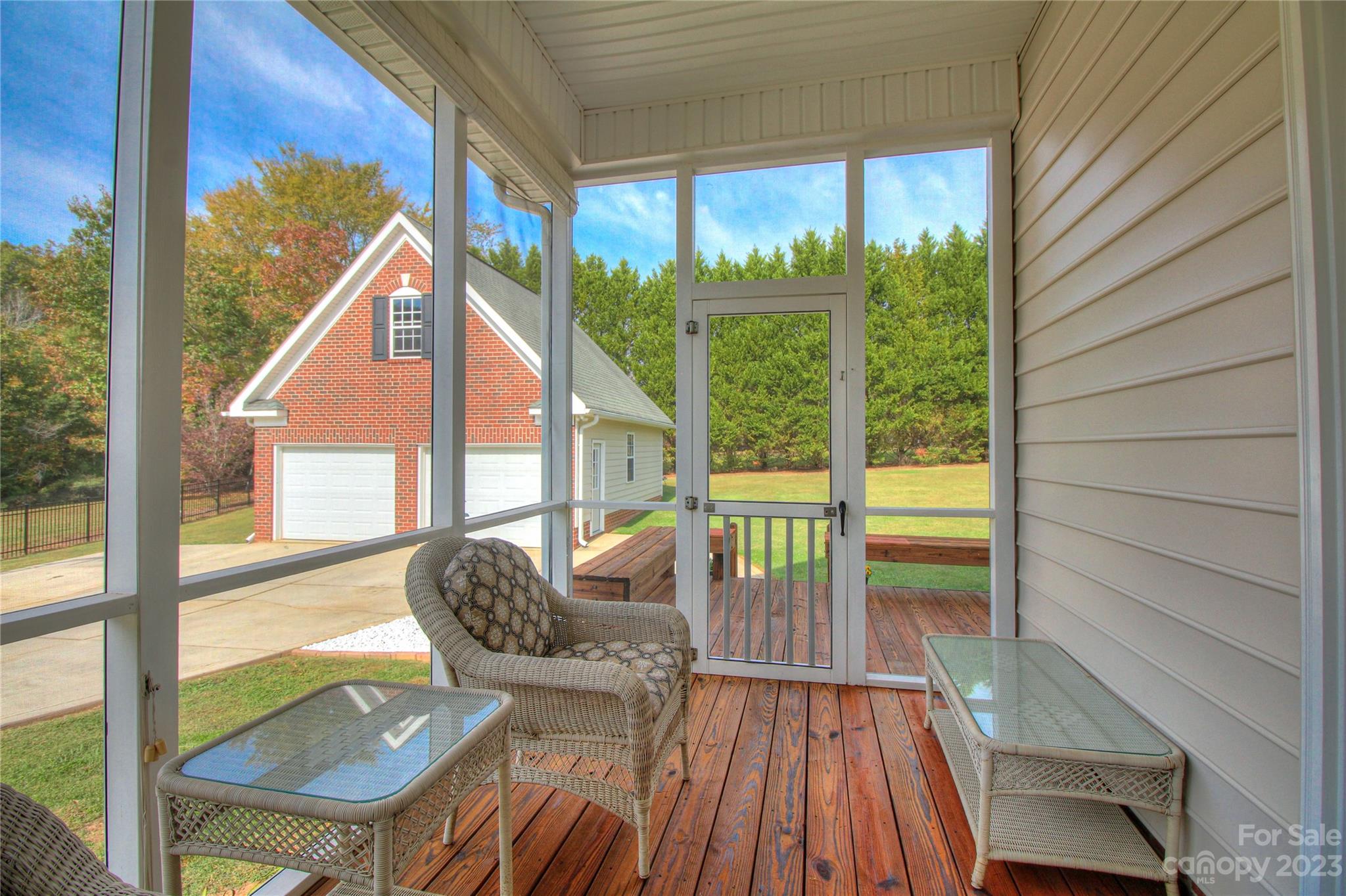 1016 Wesley Downs Road Wesley Chapel, NC 28110 - Photo 27 of 40 a view of balcony with two chairs and a table