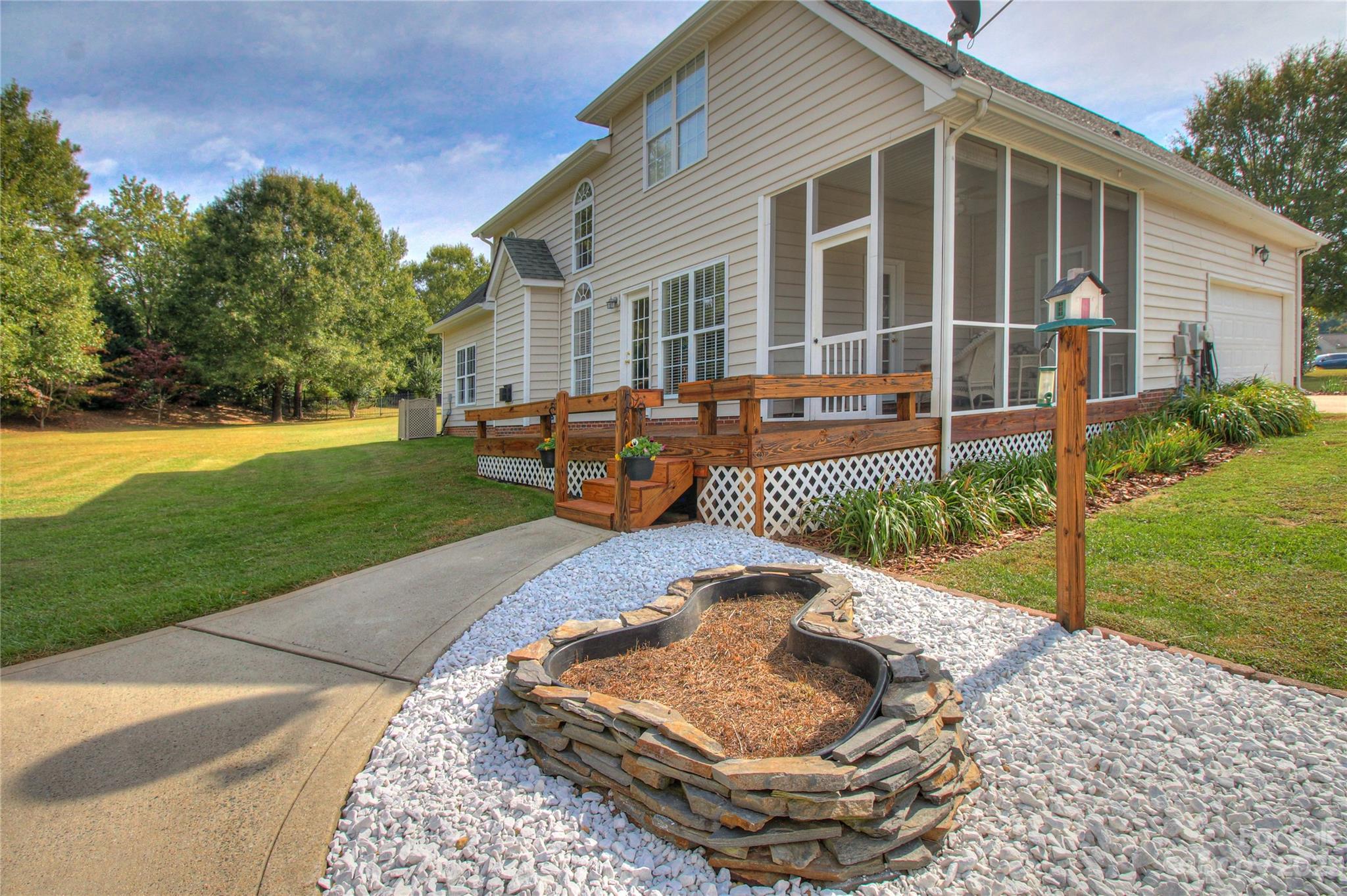 1016 Wesley Downs Road Wesley Chapel, NC 28110 - Photo 28 of 40 front view of a house with a yard