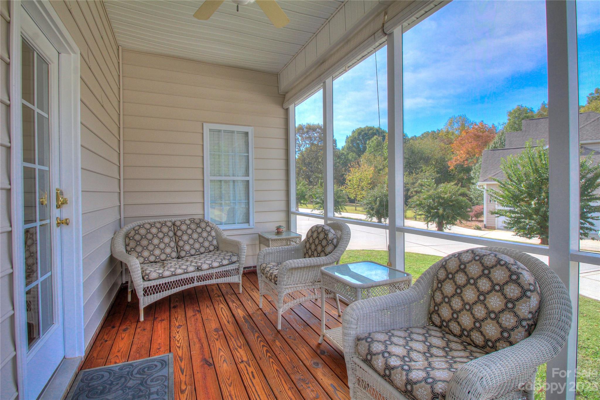 1016 Wesley Downs Road Wesley Chapel, NC 28110 - Photo 29 of 40 a living room with couch and a large window
