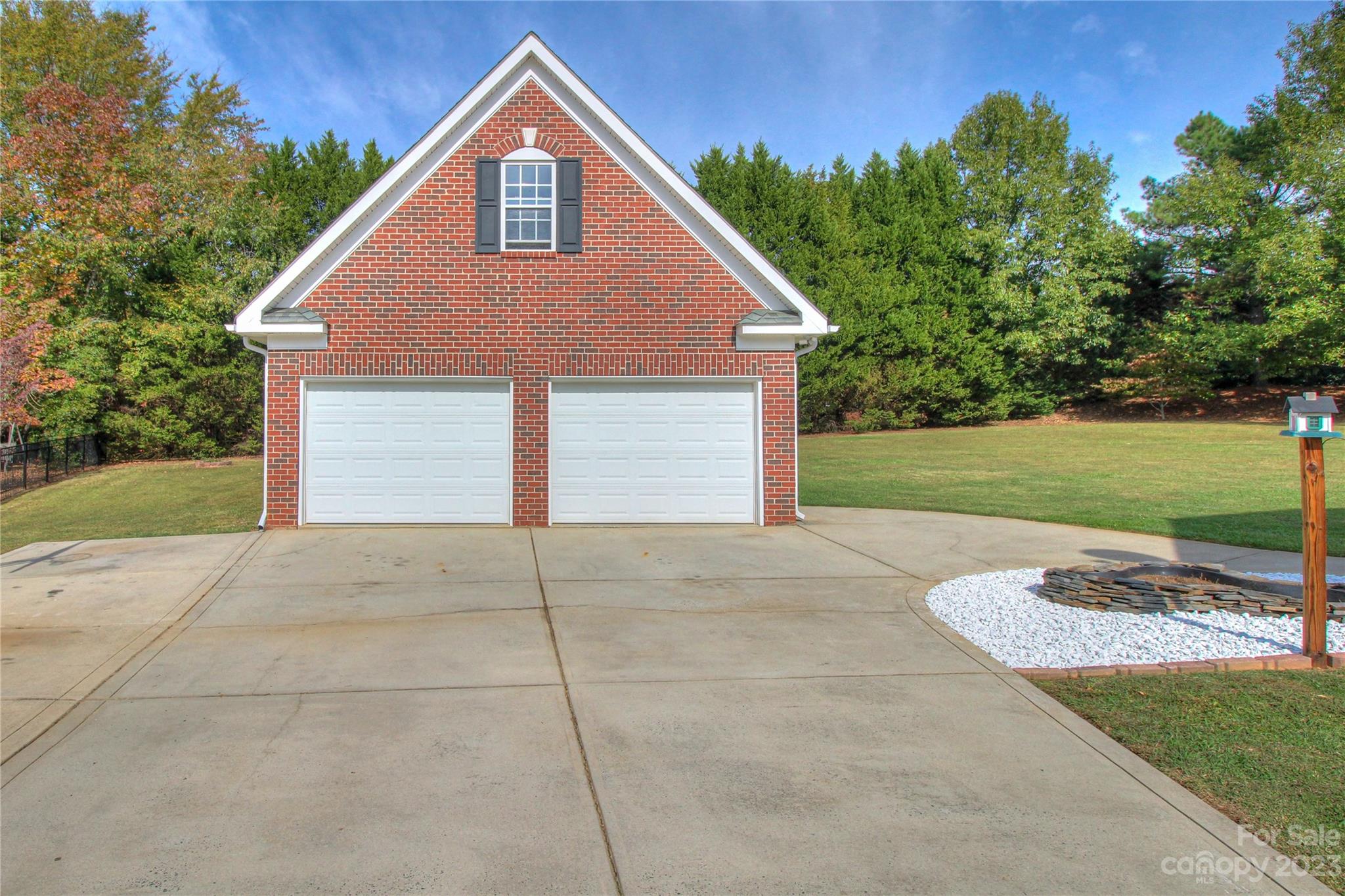 1016 Wesley Downs Road Wesley Chapel, NC 28110 - Photo 32 of 40 a view of a backyard of house