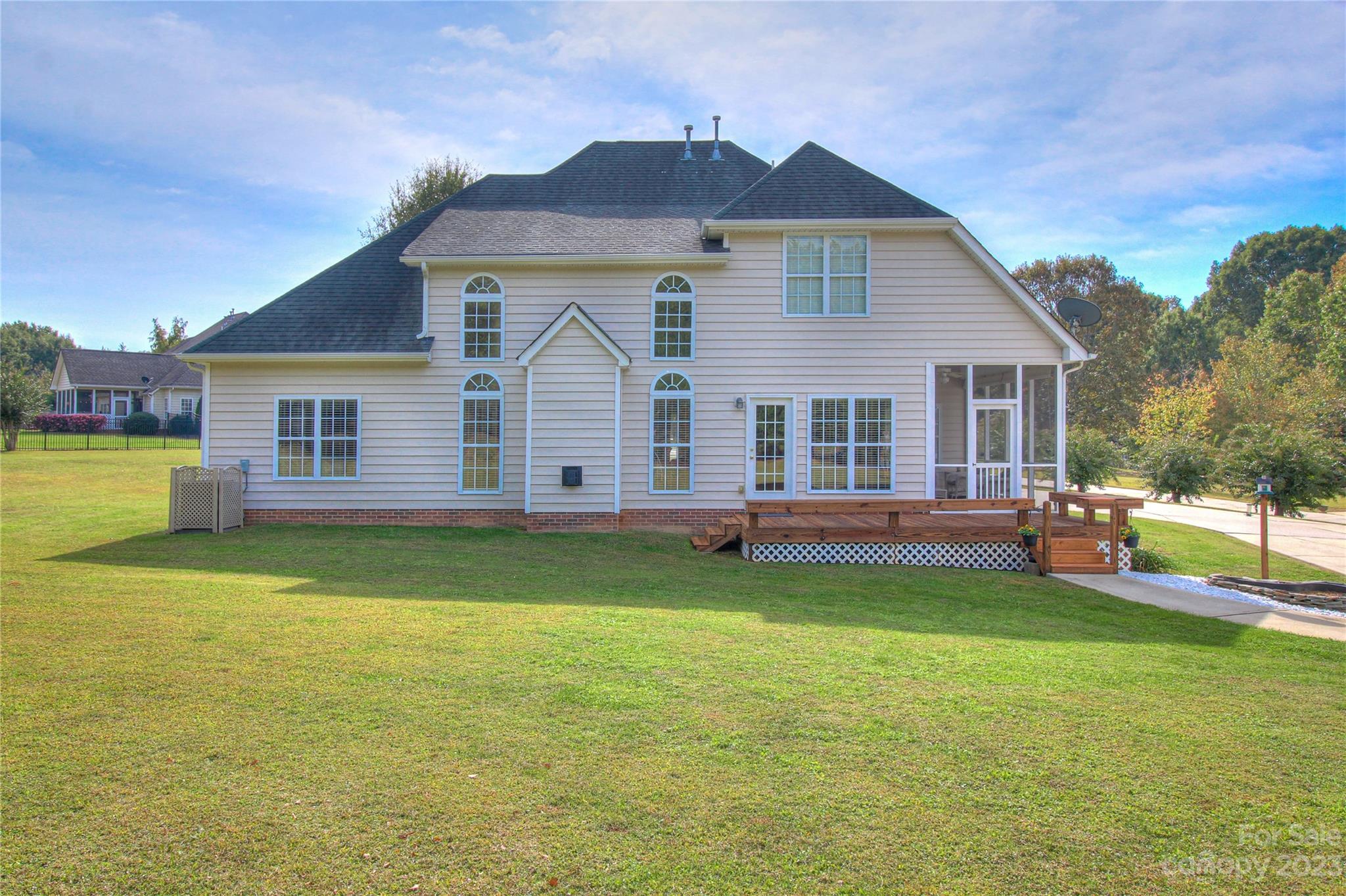 1016 Wesley Downs Road Wesley Chapel, NC 28110 - Photo 34 of 40 a view of a house with a yard porch and sitting area