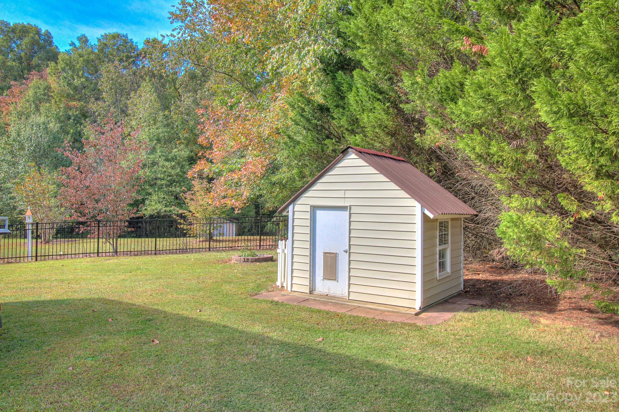 1016 Wesley Downs Road Wesley Chapel, NC 28110 - Photo 38 of 40 a view of a backyard with green space
