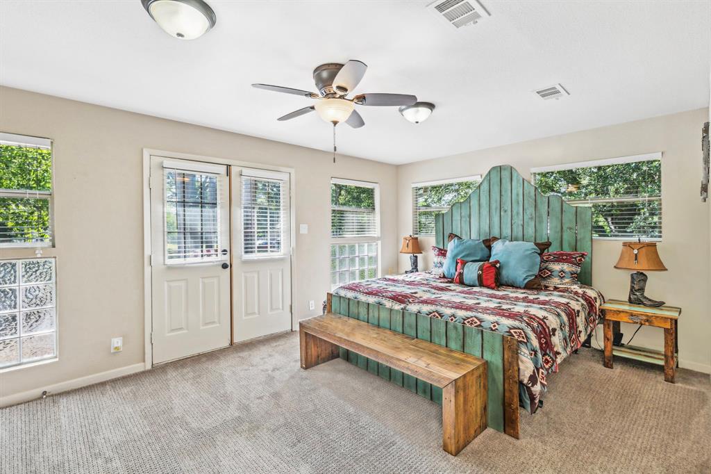 142 Peninsula Point Terrace Mabank, TX 75156 - Photo 10 of 29 a bedroom with a bed and window