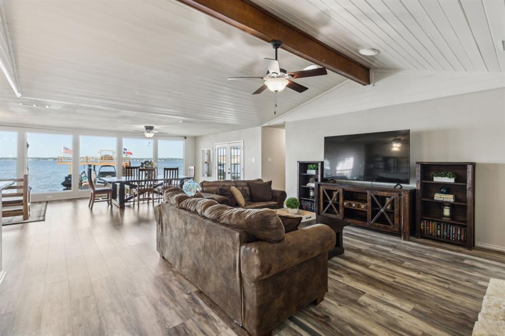 142 Peninsula Point Terrace Mabank, TX 75156 - Photo 18 of 29 a living room with furniture and a flat screen tv