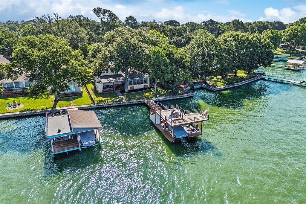 142 Peninsula Point Terrace Mabank, TX 75156 - Photo 2 of 29 swimming pool view with a garden space and sitting area