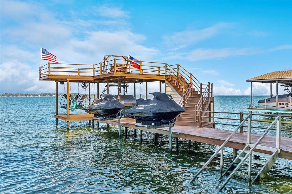 142 Peninsula Point Terrace Mabank, TX 75156 - Photo 24 of 29 a view of a chairs and table on the terrace
