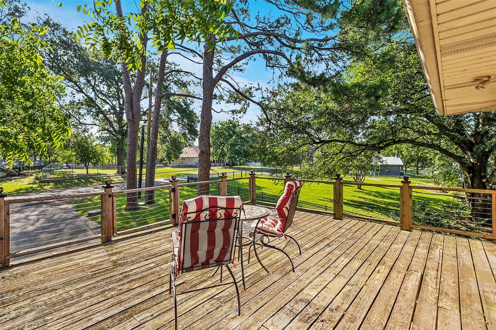 142 Peninsula Point Terrace Mabank, TX 75156 - Photo 26 of 29 a view of a terrace with wooden floor and outdoor seating