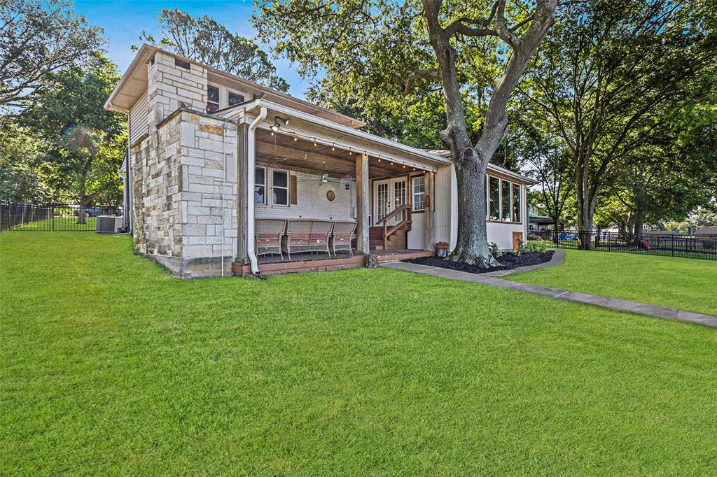 142 Peninsula Point Terrace Mabank, TX 75156 - Photo 4 of 29 a view of a house with backyard