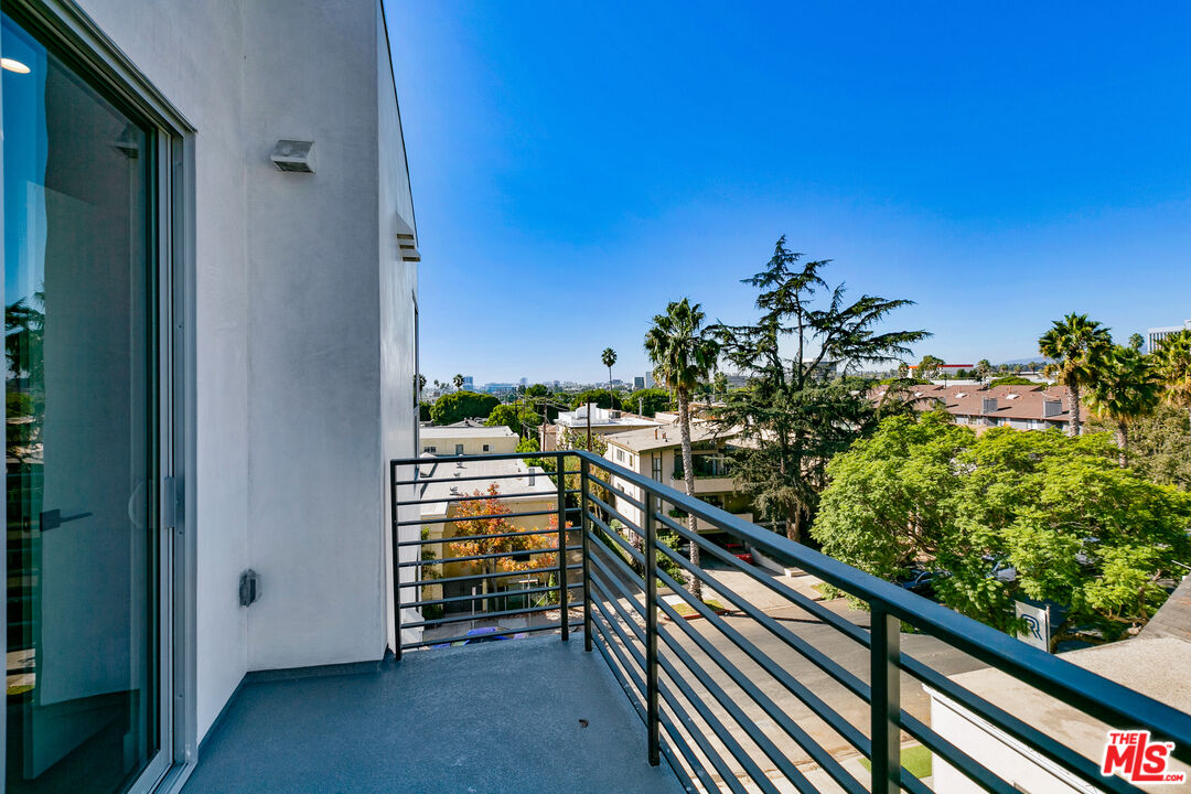 12431 Rochester Avenue, Unit 206 Los Angeles, CA 90025 - Photo 11 of 23 a view of balcony from a balcony