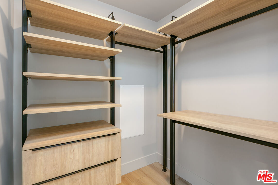 12431 Rochester Avenue, Unit 206 Los Angeles, CA 90025 - Photo 9 of 23 a utility room with washer and dryer