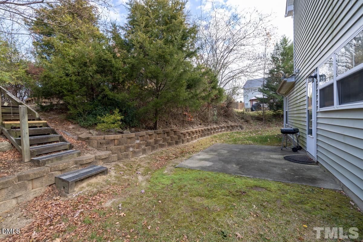 3617 Hamilton Mill Drive Raleigh, NC 27616 - Photo 20 of 20 a view of a backyard with stairs