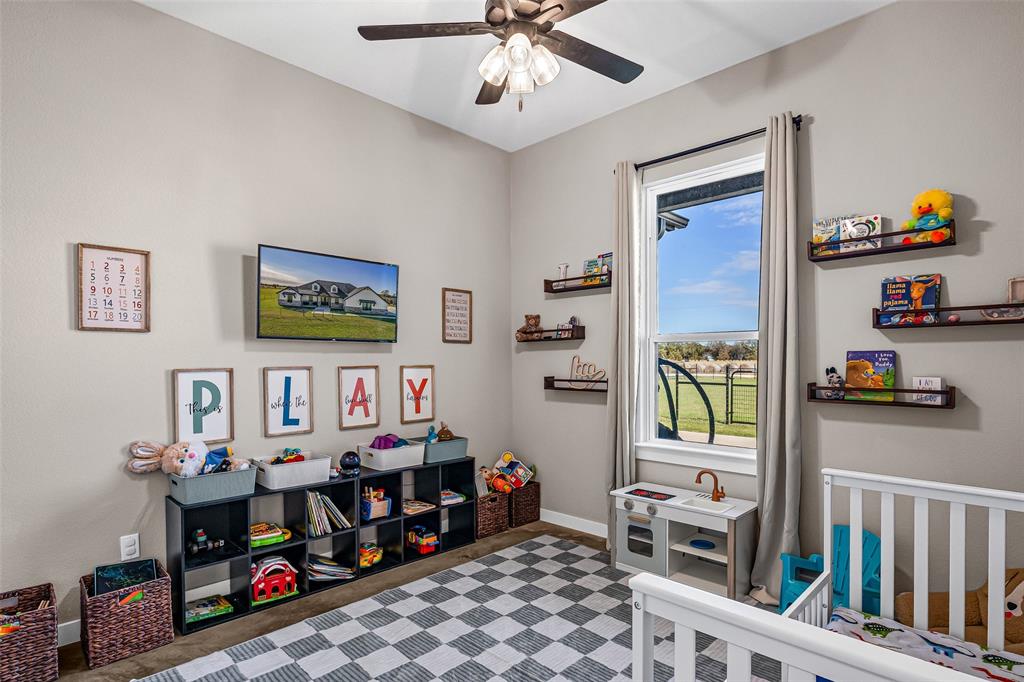 310 Runyan Rnch Road Tolar, TX 76476 - Photo 19 of 35 Playroom featuring baseboards and a ceiling fan