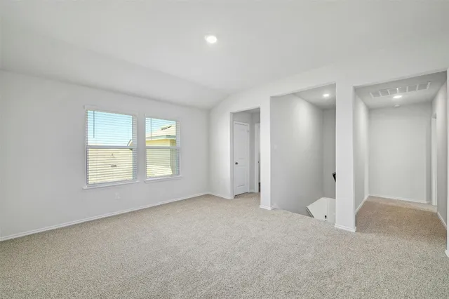 a bathroom with a granite countertop sink a toilet and bathtub