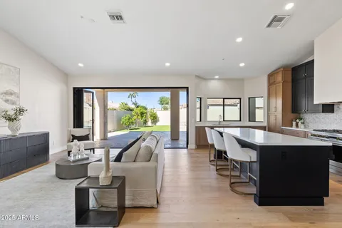 a view of a white building with large windows