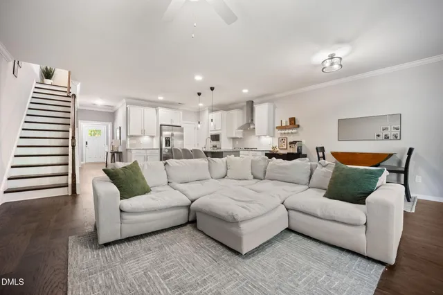 a living room with furniture and a couch