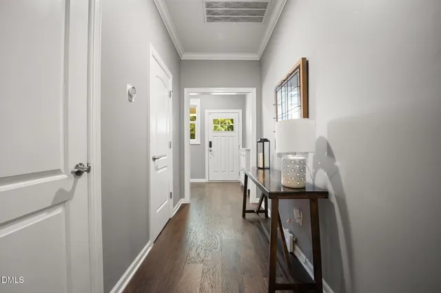 a view of a livingroom from a hallway