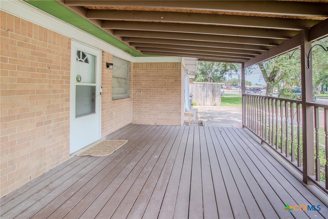2903 Gayle Street Victoria, TX 77901 - Photo 4 of 21 a view of a balcony with wooden floor