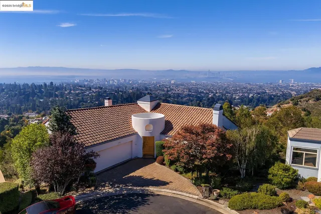 an aerial view of a house with a garden