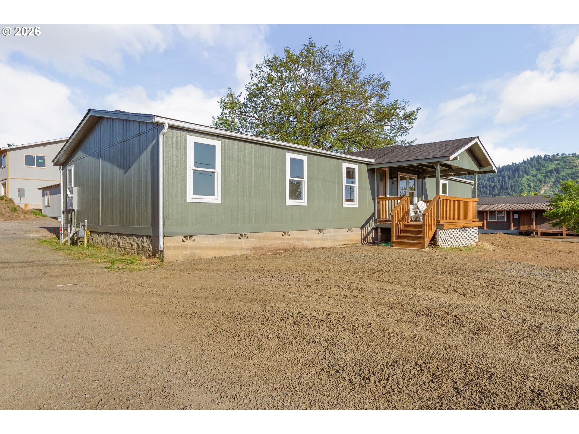 70 Darrell Avenue Winston, OR 97496 - Photo 28 of 39 a view of a house with backyard