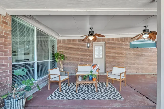 a table and chairs in a patio