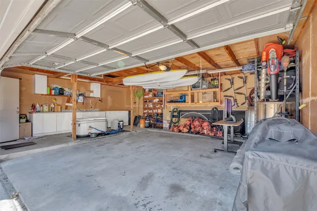 a view of a garage with storage