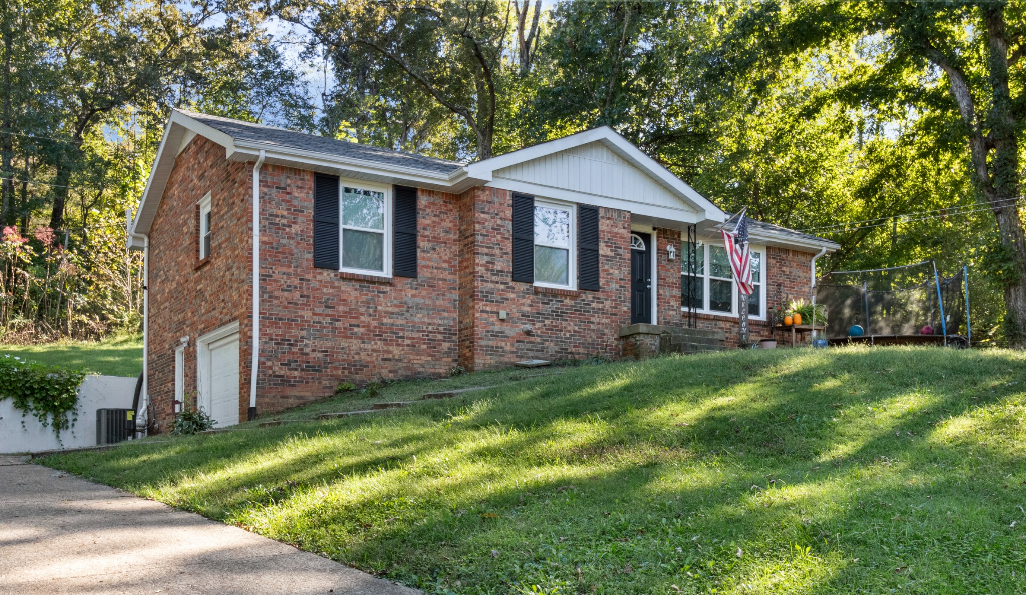 684 Dean Road Clarksville, TN 37040 - Photo 1 of 35 a front view of a house with a yard