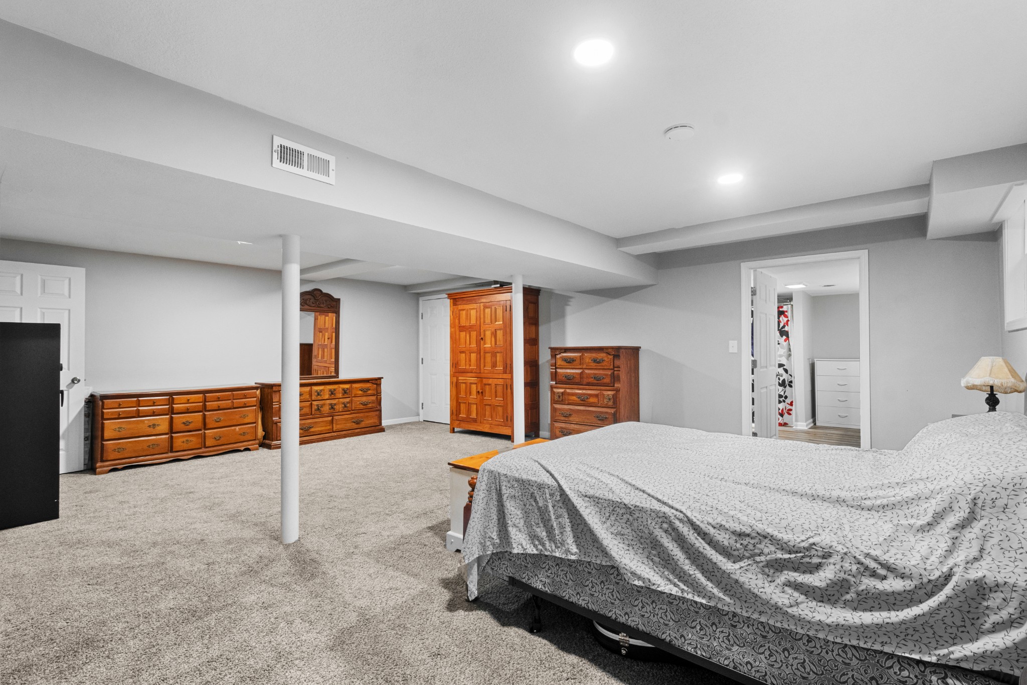 684 Dean Road Clarksville, TN 37040 - Photo 26 of 35 a bedroom with a large bed and dresser