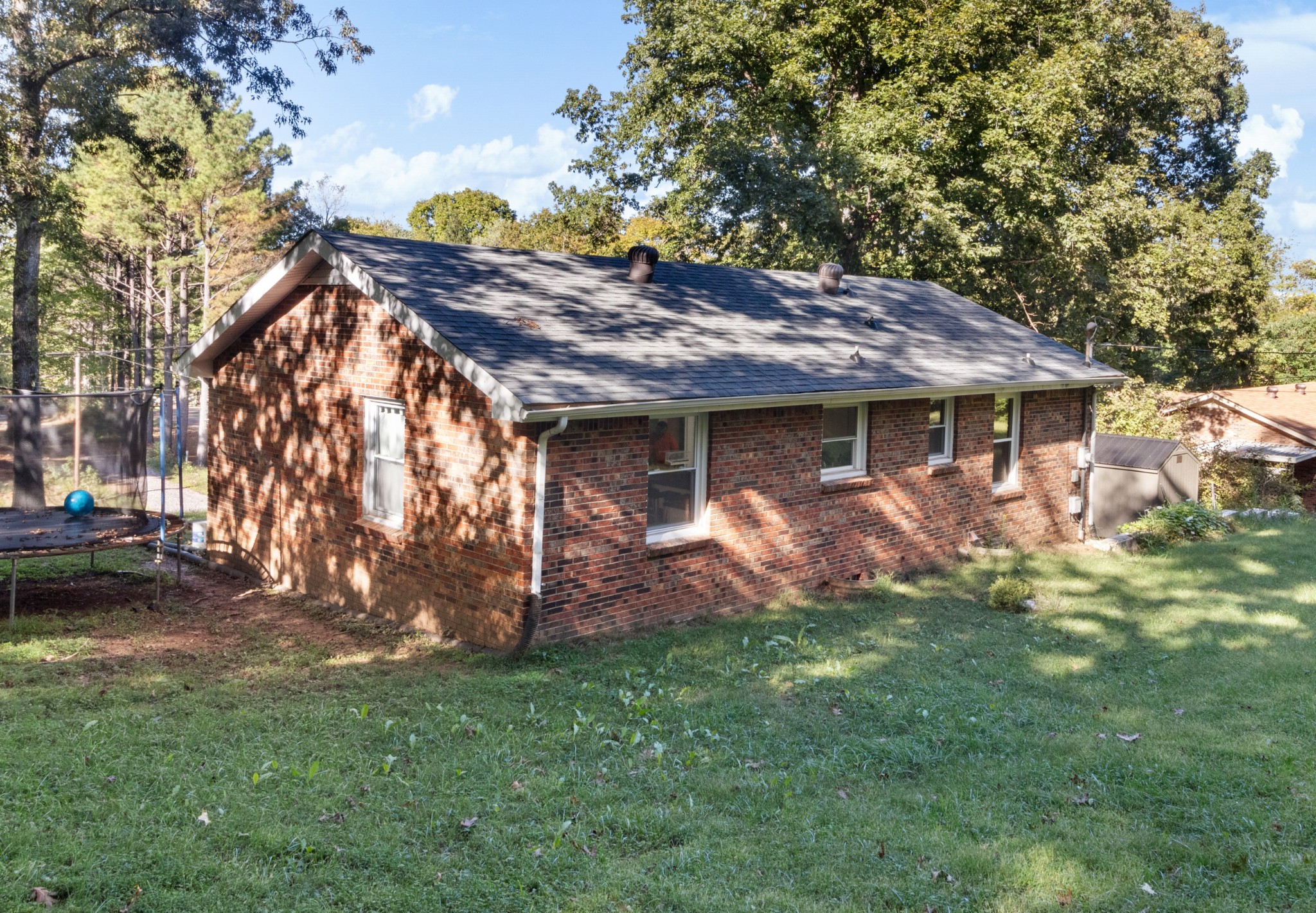 684 Dean Road Clarksville, TN 37040 - Photo 30 of 35 a view of a house with a backyard