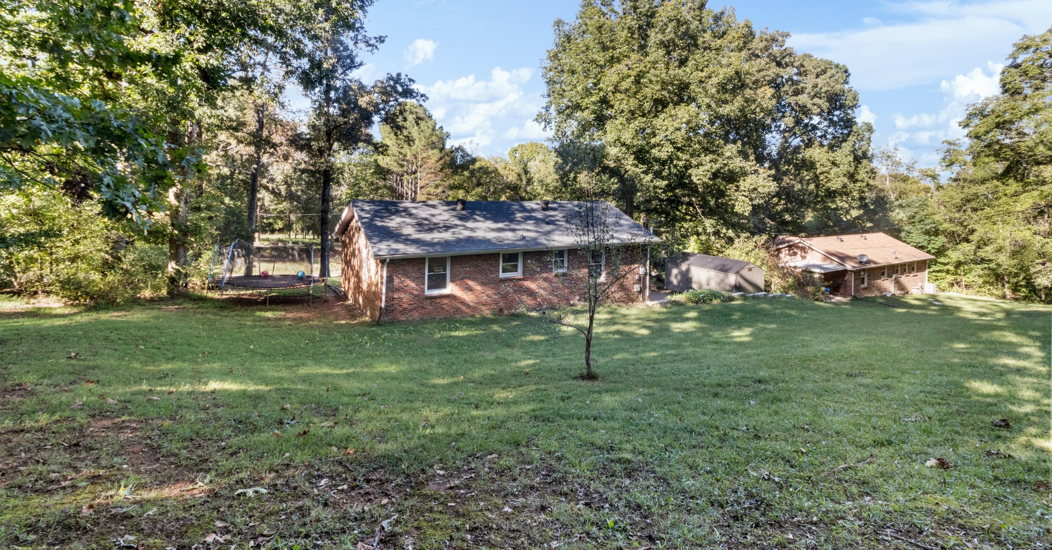 684 Dean Road Clarksville, TN 37040 - Photo 31 of 35 a view of a house with a backyard