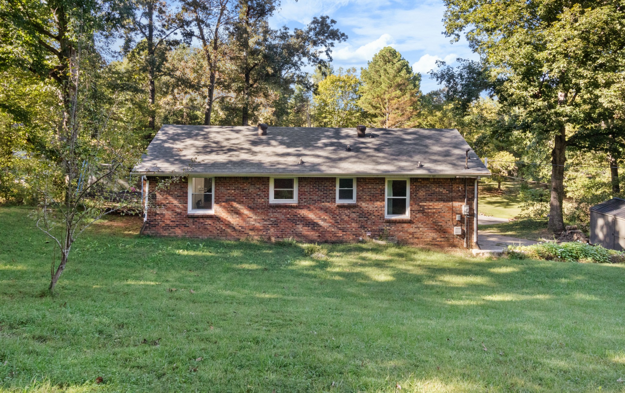 684 Dean Road Clarksville, TN 37040 - Photo 32 of 35 a front view of a house with a garden