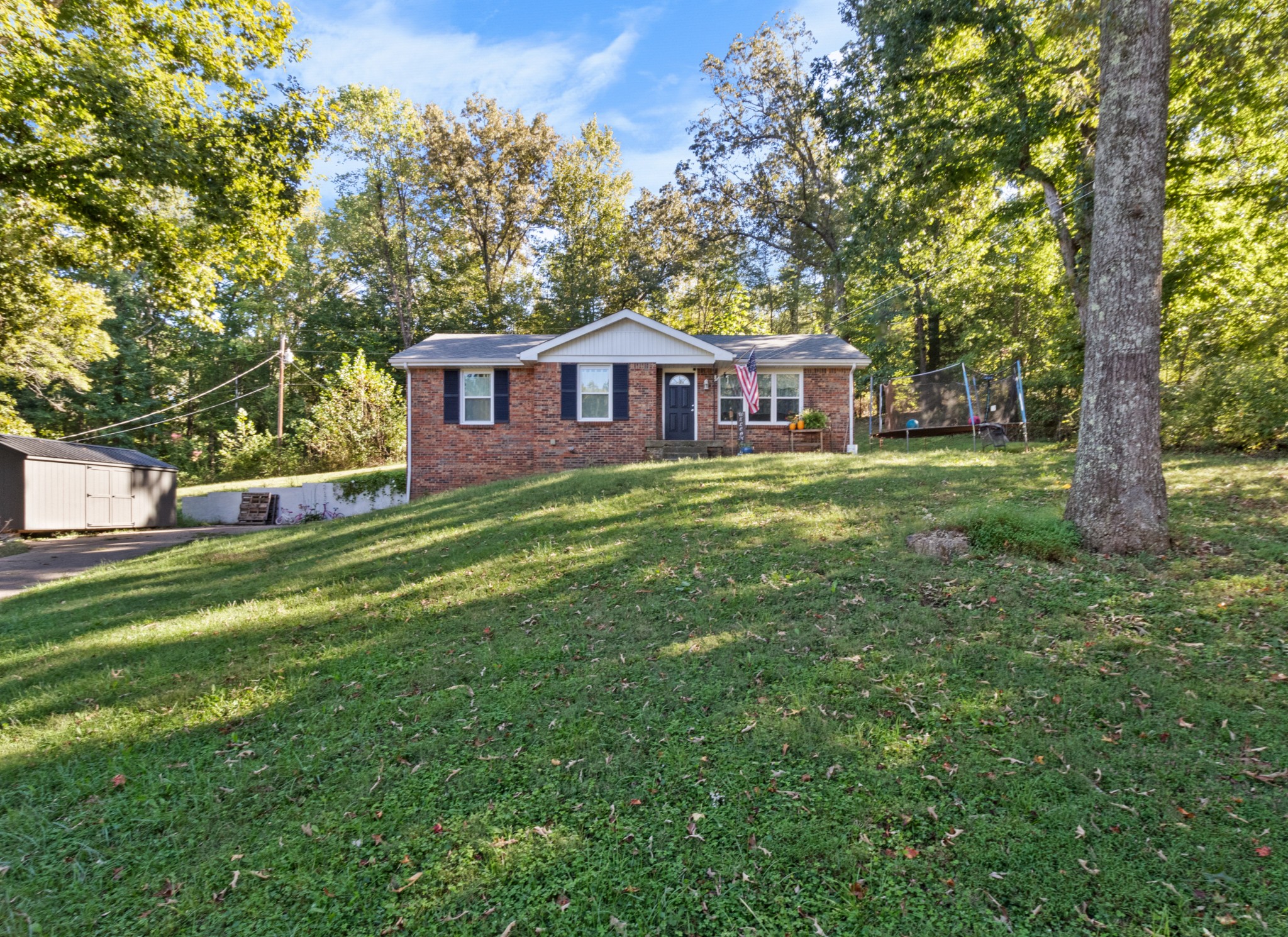 684 Dean Road Clarksville, TN 37040 - Photo 4 of 35 a front view of a house with a yard