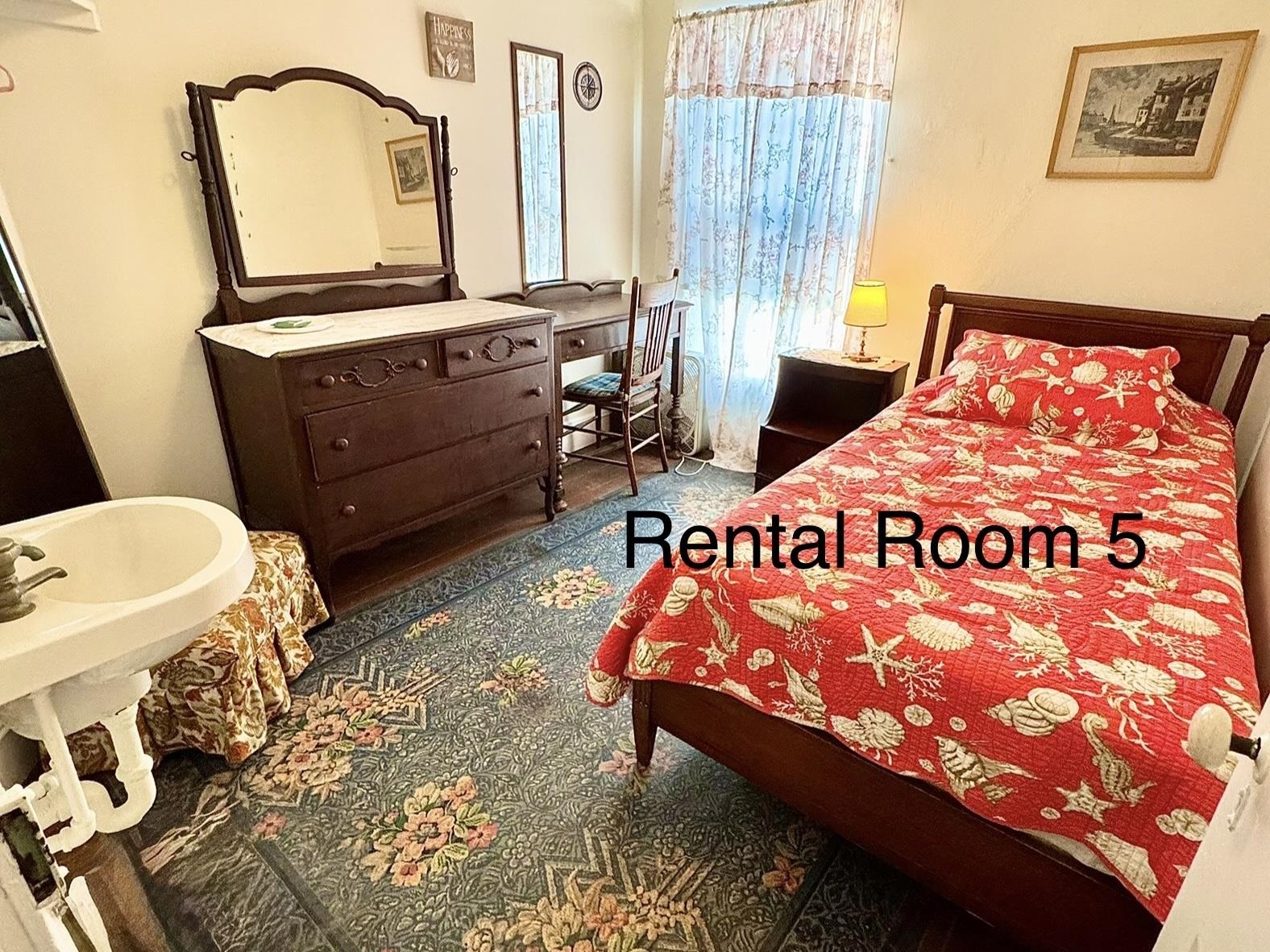 202 Perry Street Cape May, NJ 08204 - Photo 26 of 49 a bed room with a bed and a couch