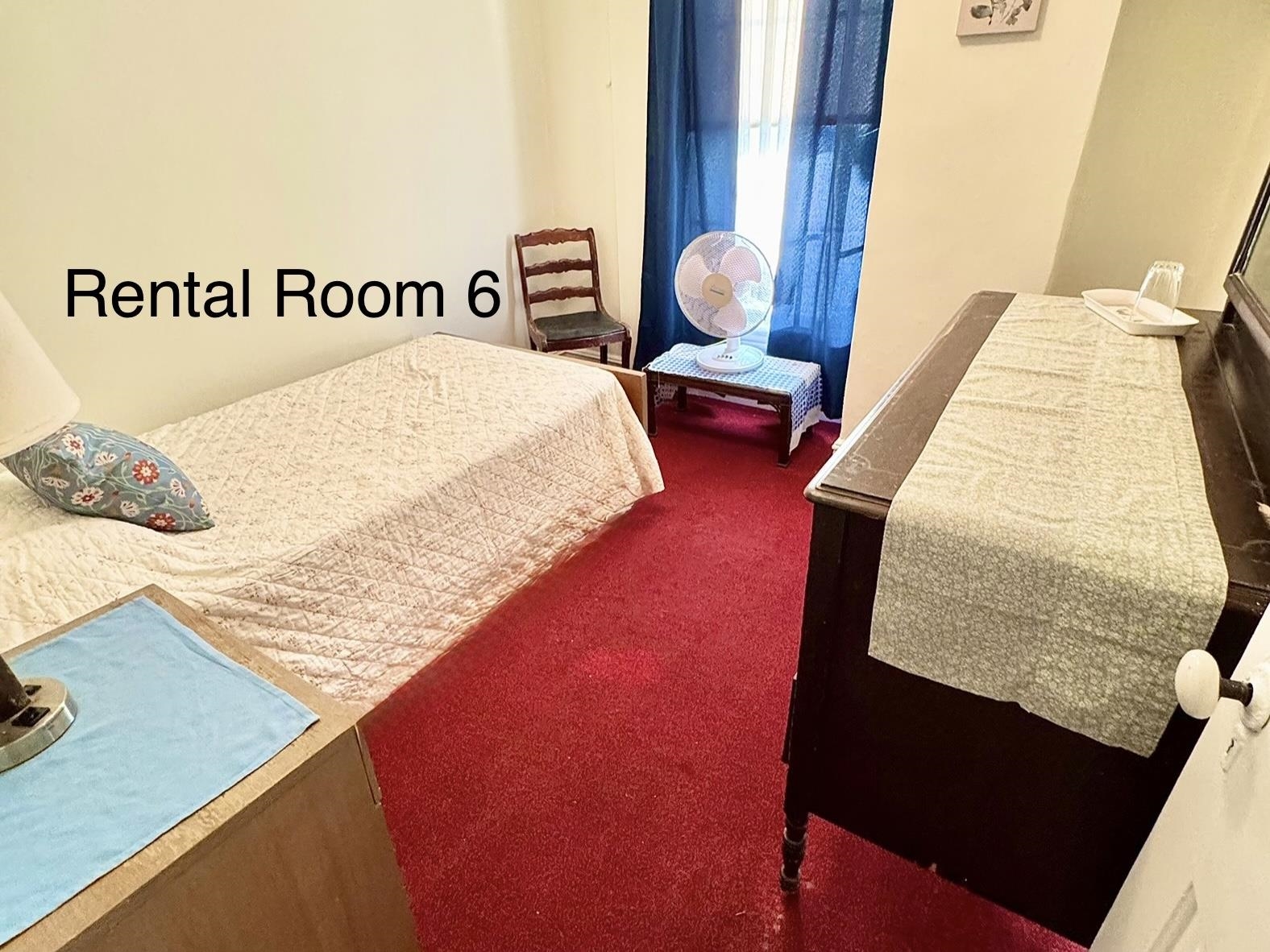 202 Perry Street Cape May, NJ 08204 - Photo 27 of 49 a bed sitting in a bedroom next to a window