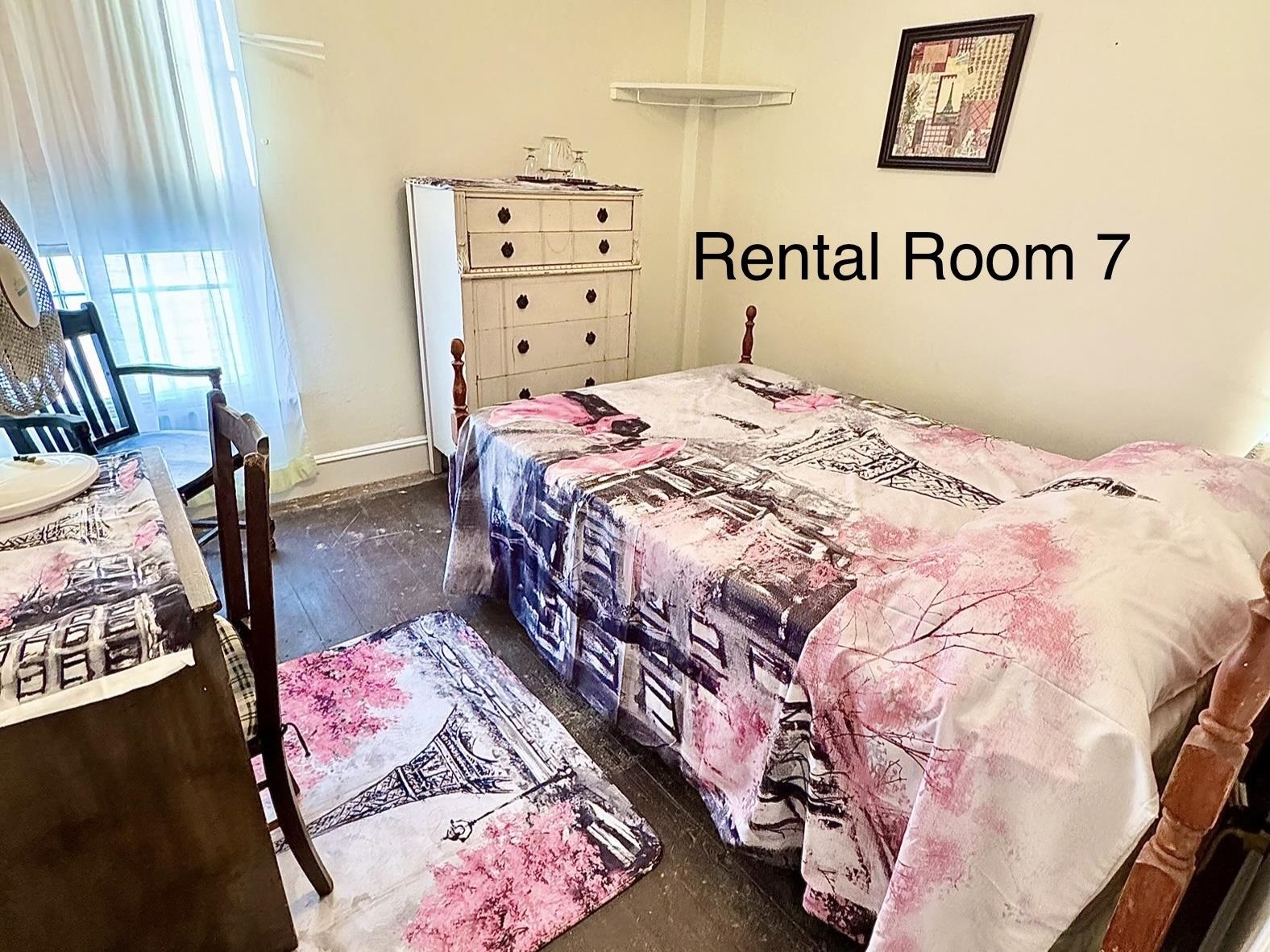 202 Perry Street Cape May, NJ 08204 - Photo 28 of 49 a bedroom with a bed and a dresser