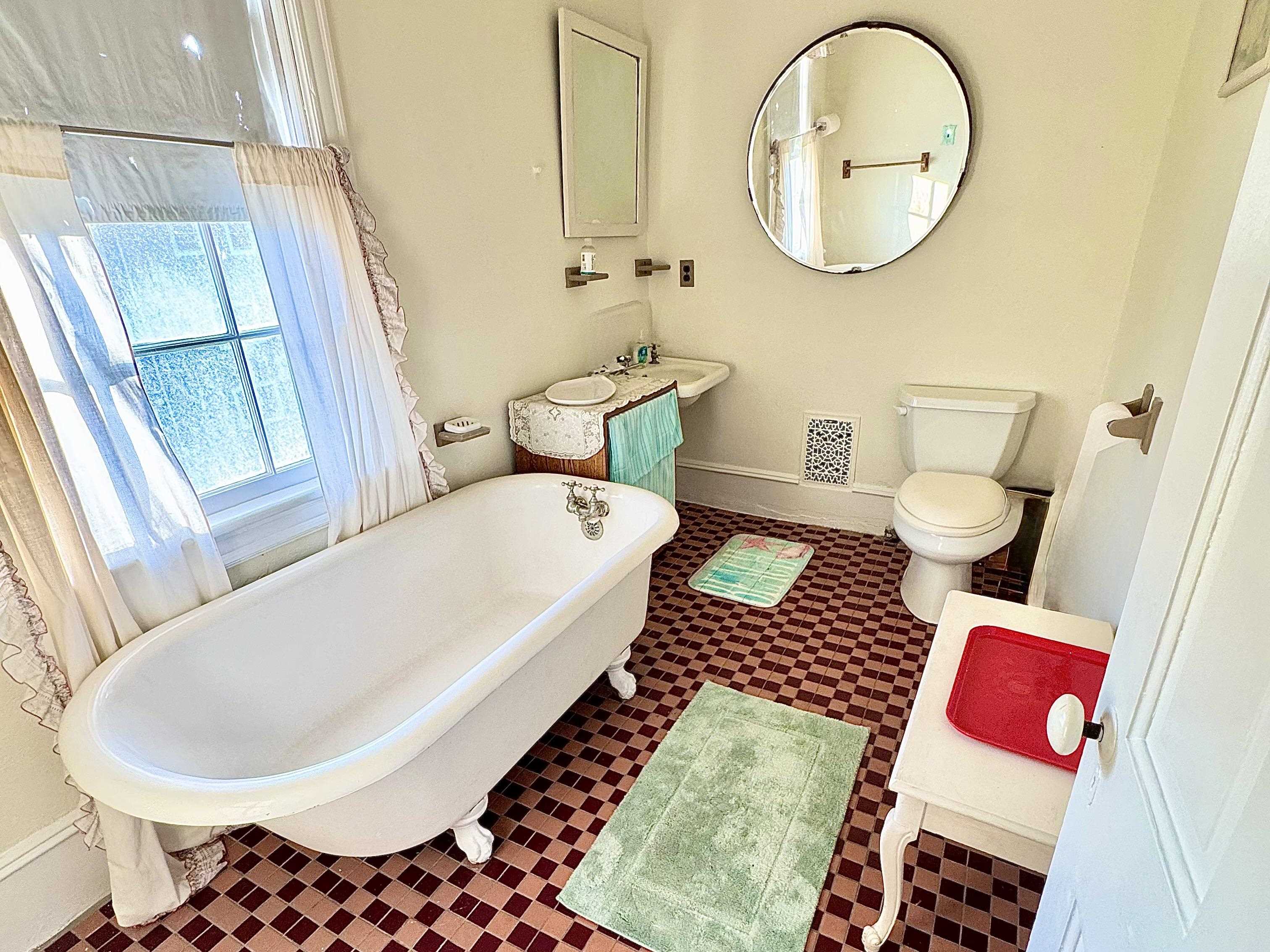 202 Perry Street Cape May, NJ 08204 - Photo 31 of 49 a living room with a couch and a table