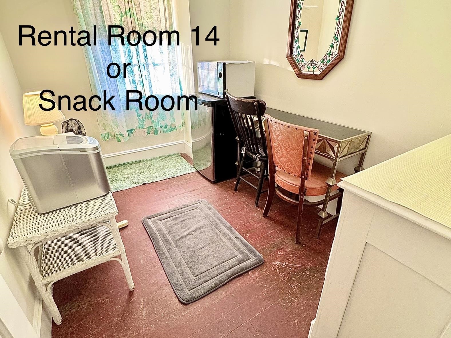 202 Perry Street Cape May, NJ 08204 - Photo 39 of 49 a view of a hallway with couch and dining table