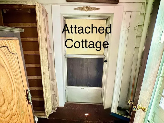 a bathroom with a sink a toilet a mirror and shower